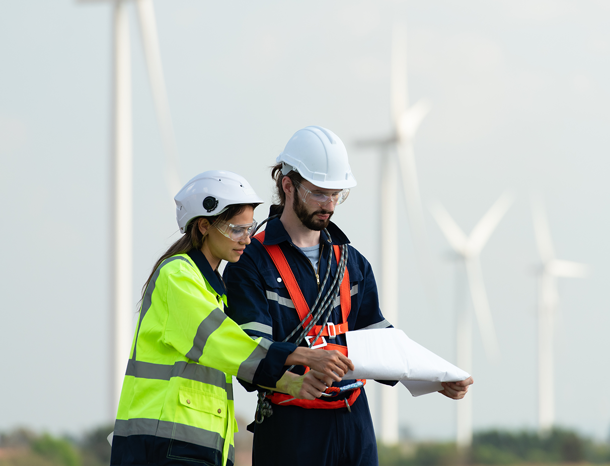 Engineers auditing renewable energy operations with secure PCI compliant utility payment systems